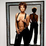 Pic of Young Janet Jackson posing sexy and braless