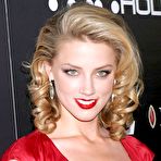 Pic of Amber Heard posing in red dress at Young Hollywood Awards