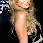 Pic of Paris Hilton pokies at Leather & Laces Super Bowl Party
