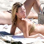 Pic of Kate Moss nipple slip on the beach in St. Barts