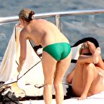 Pic of Kate Moss sunbathing topless on the yacht and beach