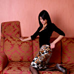 Pic of CUTIESINTIGHTS - Thin cutie with jet black hair poses in her nylons