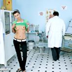 Pic of Angela visits bizzare gyno doctor to have her pussy stretched with speculum