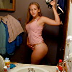Pic of realteenpictureclub.com - Hot teen poses in the mirror showing her nice tits