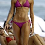 Pic of Stacy Keibler in blue and pink bikini on the beach paparazzi shots