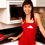 Pic of Erotic shemale poses in the kitchen