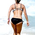 Pic of Kaley Cuoco wearing a bikini at a pool in Mexico