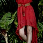 Pic of Jade Couture strips out of red dress in the jungle
