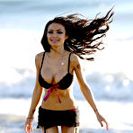 Pic of Tila Tequila deep cleavage in black bikini on the beach
