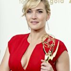 Pic of Kate Winslet in red dress posing at Emmy Awards