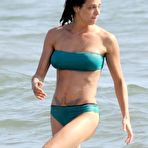 Pic of Asia Argento in blue bikini on the beach with her husband