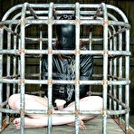Pic of SexPreviews - Hazel Hypnotic is bound and caged with lezdom Nyssa Nevers using toys