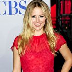 Pic of Kristen Bell in red dress posing at 38th Peoples Choice Awards