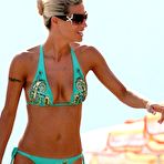 Pic of Michelle Hunziker in bikini on the beach paparazzi shots
