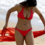 Pic of Padma Lakshmi in red bikini on a beach