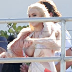 Pic of Lindsay Lohan boob out and upskirt in Miami