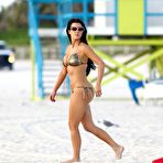 Pic of Kim Kardashian looking sexy in bikini on Miami beach paparazzi shots