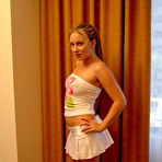 Pic of Christie Lee - Seductive teen chick Christie Lee strips her mini skirt and shows her wet pussy.