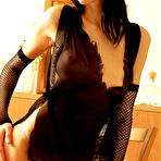 Pic of Elena F - Elena F takes her expensive black lingerie off and teases us in sexy black stockings.