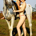 Pic of Eva F, Silvia B - Eva F and Silvia B strip together outdoors and then ride a horse nude together.