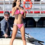 Pic of Alessandra Ambrosio wearing bikinis on a beach