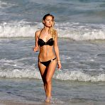 Pic of Petra Benova in black bikini on a beach
