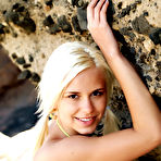 Pic of Lola Myluv - Alluring blonde model Lola Myluv strips on the rocks and shows us her perky tits.