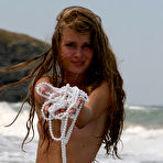 Pic of Nastya A - Petite Nastya A takes her clothes off to get a perfect tan and to enjoy a naked swim.