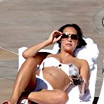 Pic of Myleene Klass sunbathing in white bikini and braless