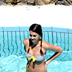 Pic of Jessica Alba swimming in the pool in gray bikini