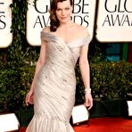 Pic of Milla Jovovich posing at Golden Globe Awards 2011 in long night dress