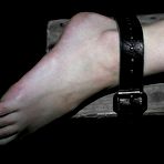 Pic of Bound bondage girl Kristine Kink gets her feet and asshole ruthlessly tortured.