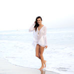 Pic of Alessandra Ambrosio white clothed on the beach photoshoot