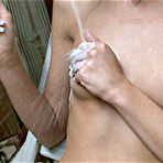 Pic of BrookeSkye.com: Redhead cutie with small tits takes a milk shower outdoors