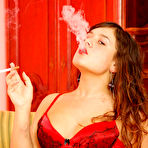 Pic of Smoking slut with big black toy at wetandpuffy.com