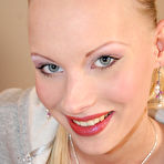 Pic of Gitta Blond - Beautiful teen gal Gitta Blond moans hard as her passionate lover bangs her mouth.