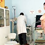 Pic of Nasty gyno doctor rubbing a clit of an elder dame Tatana during gyno test