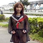 Pic of Mikan Hot Asian gal stands by a fence :: Japanese Flashers