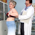Pic of Middle aged Ruzena taking detailed gyno inspection by gyno woman doctor