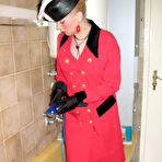 Pic of Wet messy all wam slut with red dress and nylon stockings in royal shower.  Movie 08:00