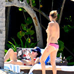 Pic of Kate Moss topless on a beach in Jamaica