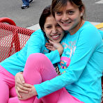 Pic of Two latina girls in tight pink leggings have fun in the park