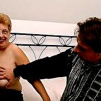 Pic of Bbw granny with saggy tits has full mouth of cock 