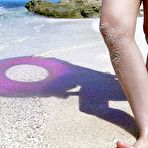 Pic of Nao Yoshizaki - Naughty Asian teen naked on the beach has fun