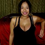 Pic of Busty Thai slut with a beautiful smile and huge boobs sucks and tit fucks