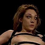 Pic of SexPreviews - Lily Labeau bound to rotating device is exposed and spanked by masters