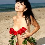 Pic of Bai Ling topless but covered in Malibu