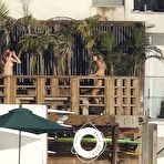 Pic of Cara Delevingne sunbathing topless on a balcony