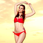Pic of Elizabeth Marxs loses her red bikini on the beach at sunset