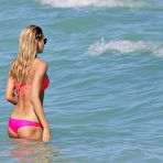 Pic of Lauren Stoner in pink bikini on a beach
